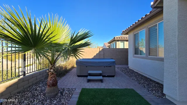 a backyard of a house with seating space