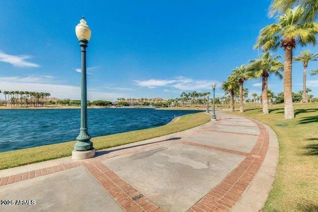 a view of a swimming pool with a patio