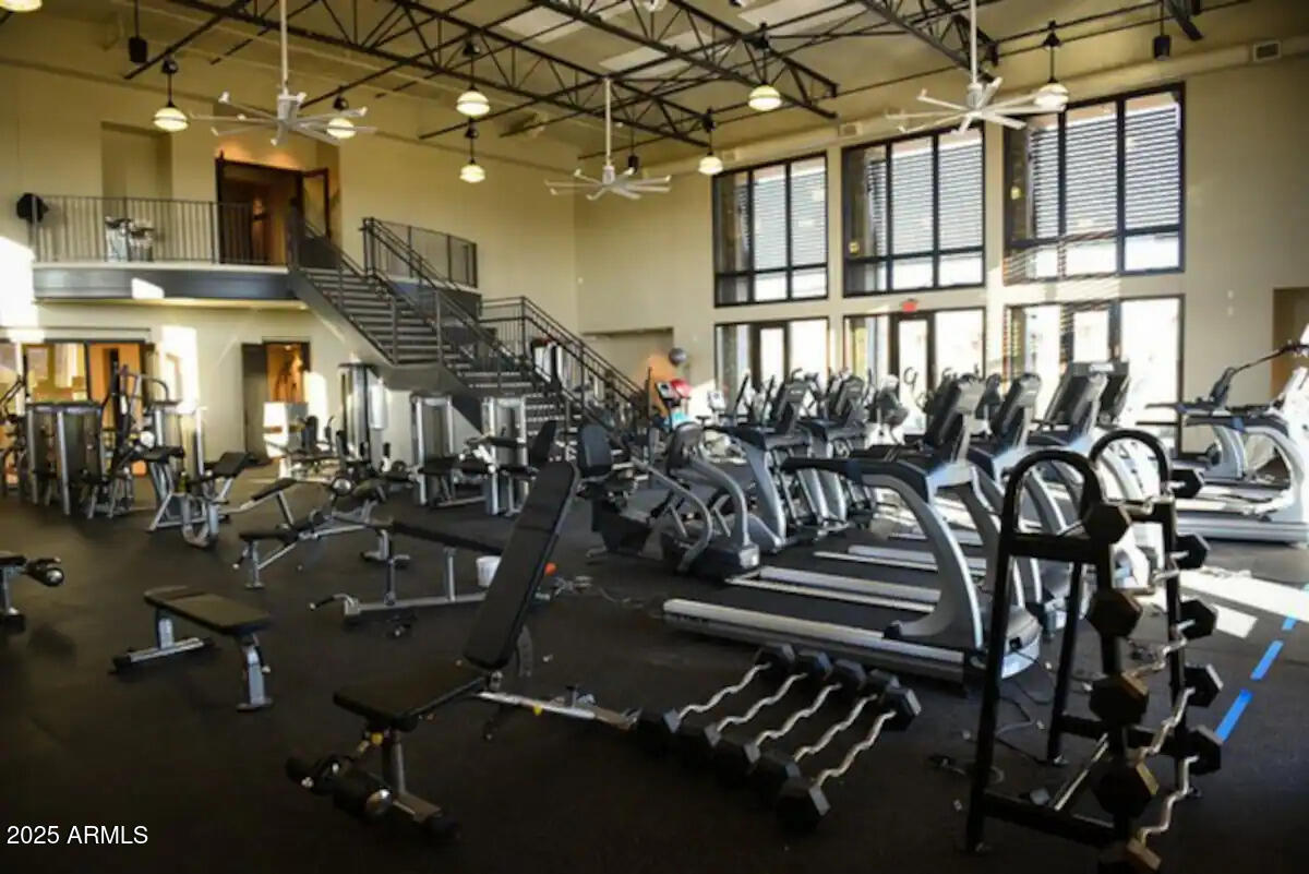 17864 West Thistle Landing Drive Goodyear, AZ 85338 - Photo 41 of 43 a view of a room with gym equipment