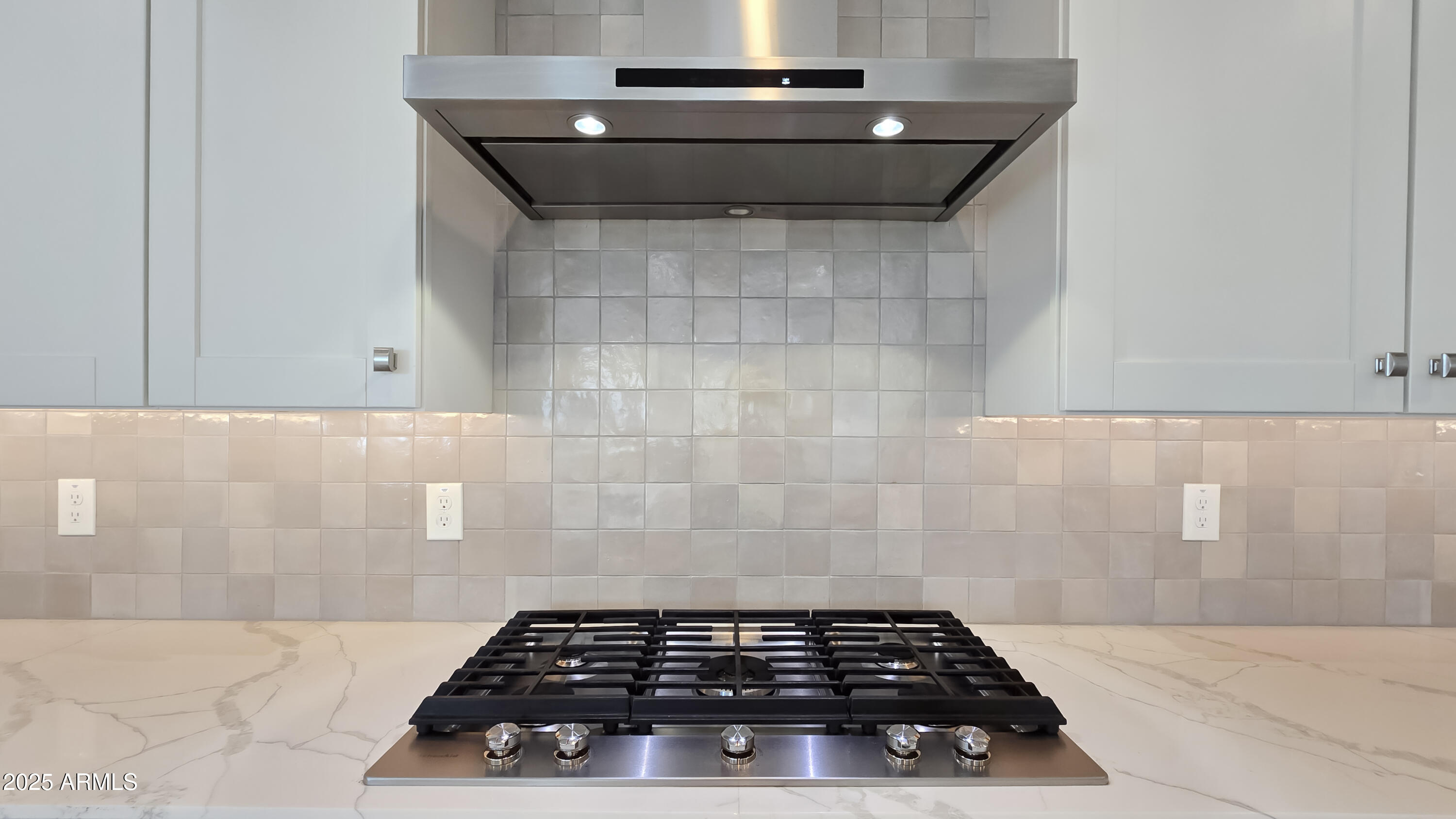 17864 West Thistle Landing Drive Goodyear, AZ 85338 - Photo 10 of 43 a bathroom with a stove