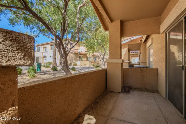 a view of a house with a back yard
