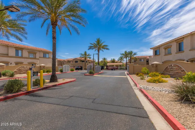 a view of house with swimming pool outdoor seating