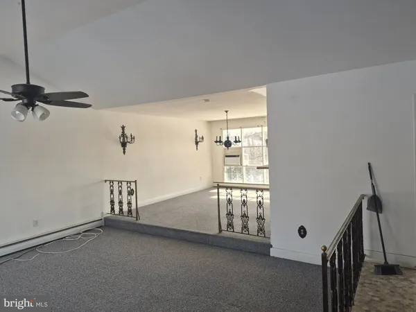a view of empty room with windows