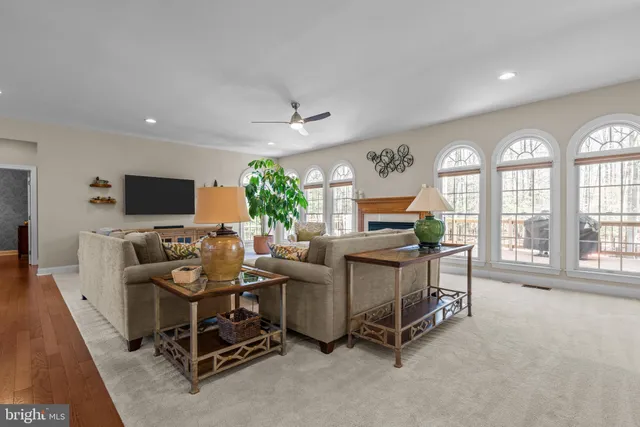 a view of a dining room with furniture and a window