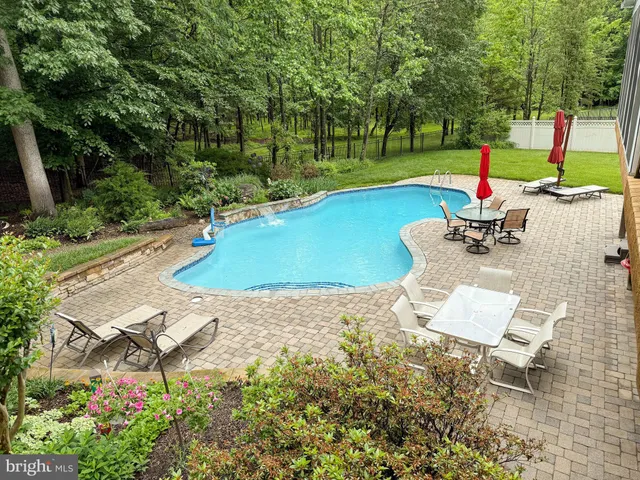 a garden view with a seating space
