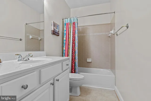 a view of a patio with a table and chairs and wooden floor