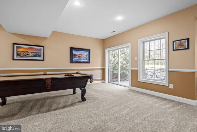 a view of a house with backyard and porch