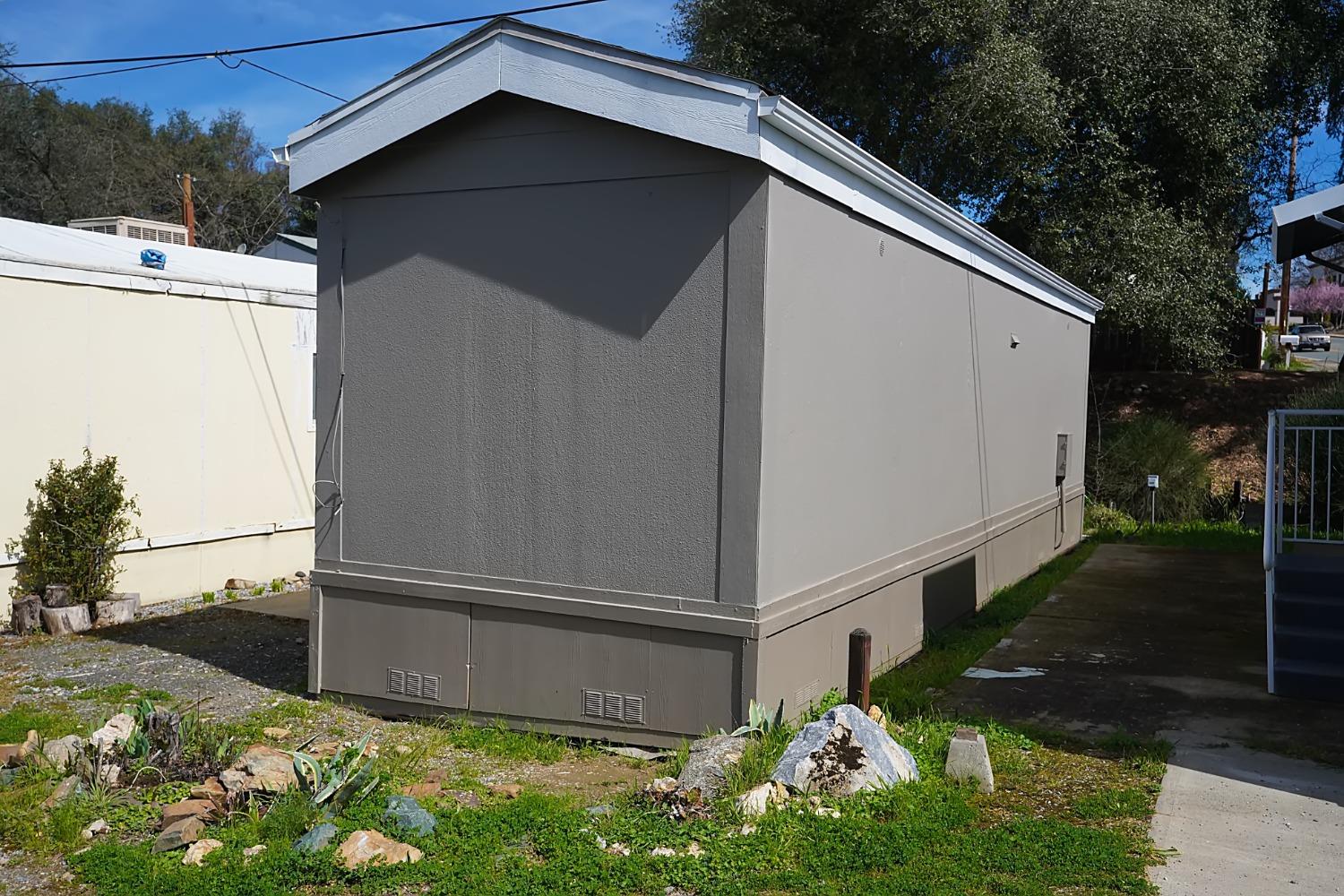 607 Mountain Ranch Road, Unit 2 San Andreas, CA 95249 - Photo 3 of 16 a backyard of a house with lots of green space