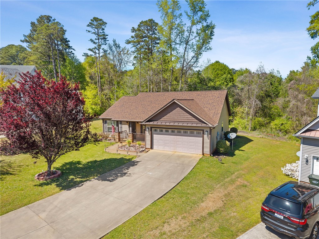 113 Crofton Court Easley, SC 29642 - Photo 28 of 33 This charming home offers a convenient driveway and an inviting front porch.