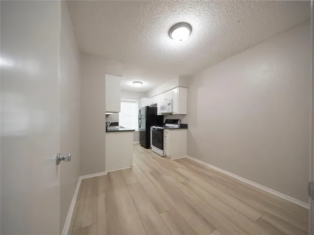 a view of kitchen with sink