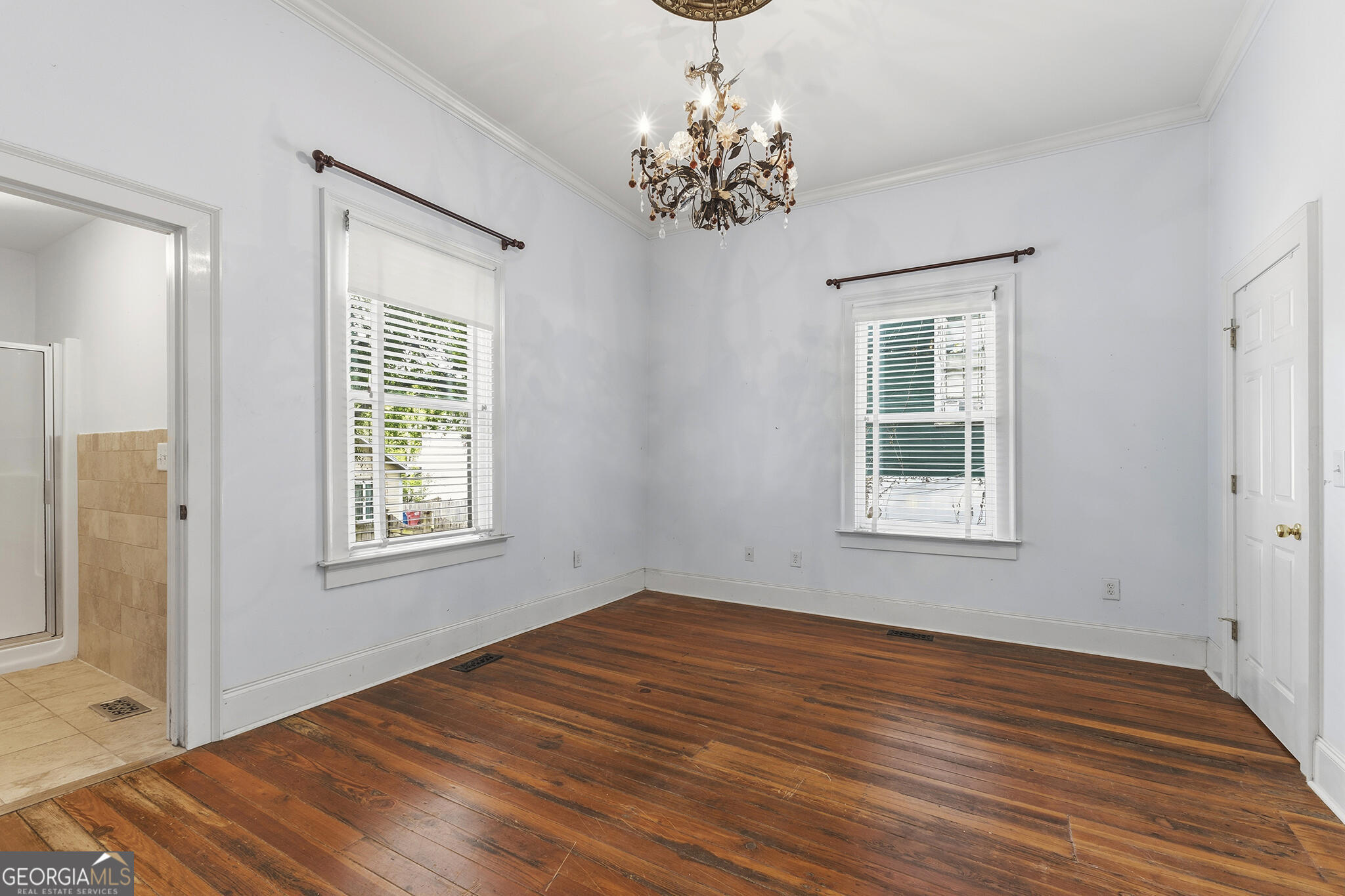 1469 Chestnut Street Macon, GA 31201 - Photo 15 of 26 a view of empty room with window and wooden floor