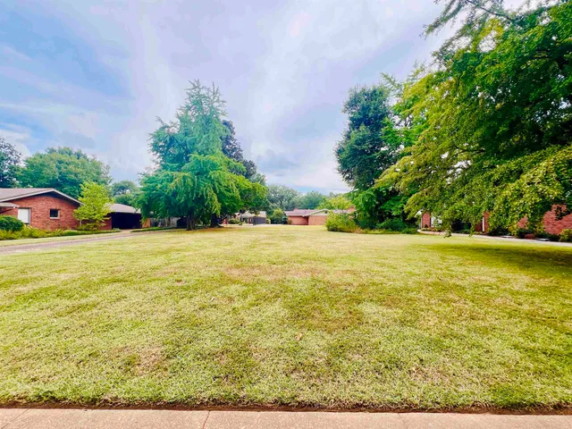 a view of an outdoor space and swimming pool