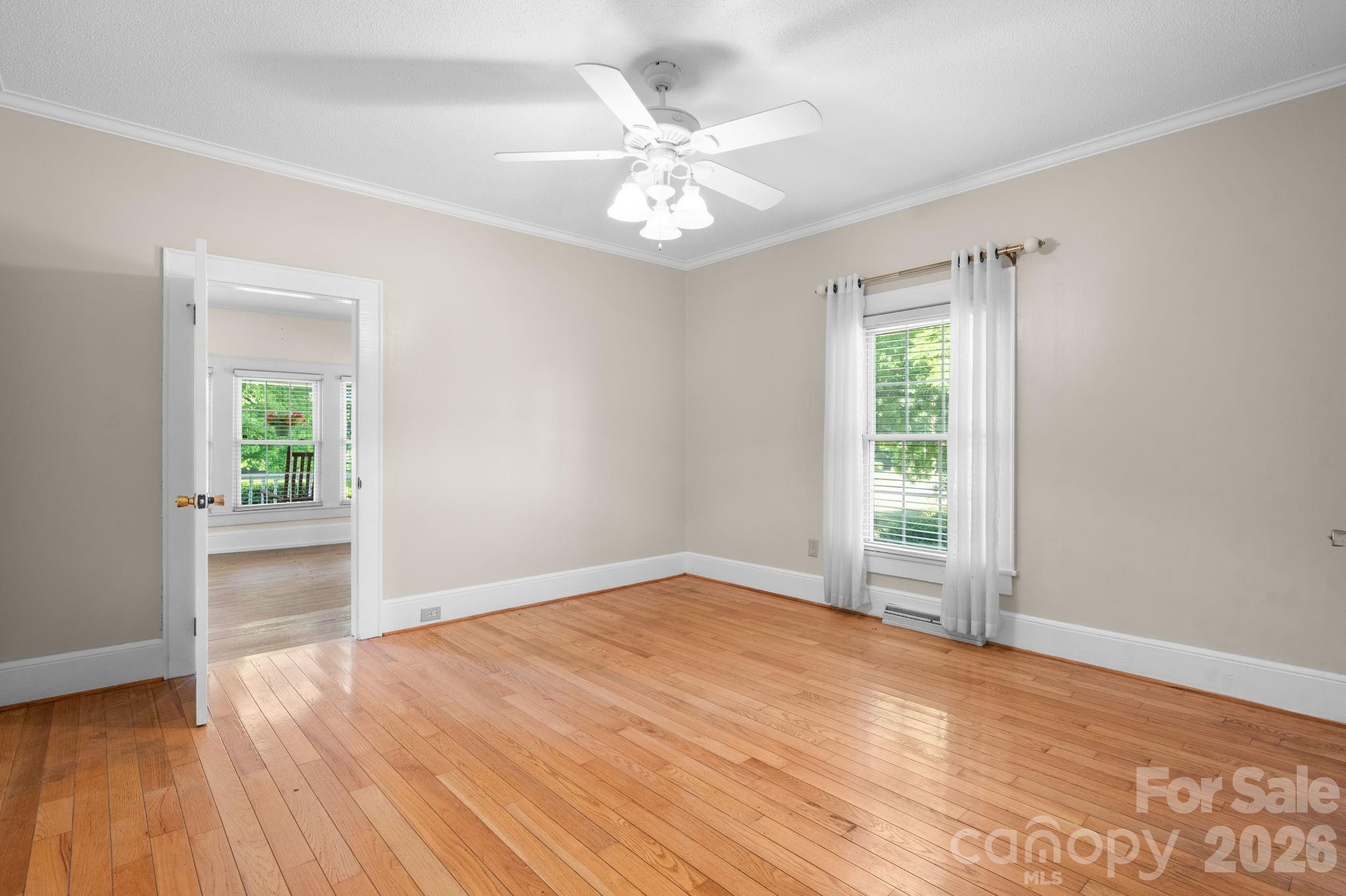 144 Hunter Bridge Road Stony Point, NC 28678 - Photo 17 of 45 wooden floor in an empty room with a window