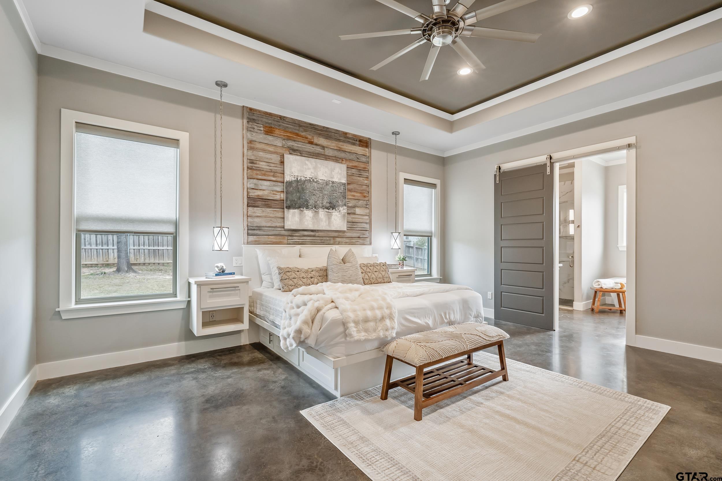 1569 Cooks Crossing Tyler, TX 75703 - Photo 15 of 39 a bedroom with a bed and window