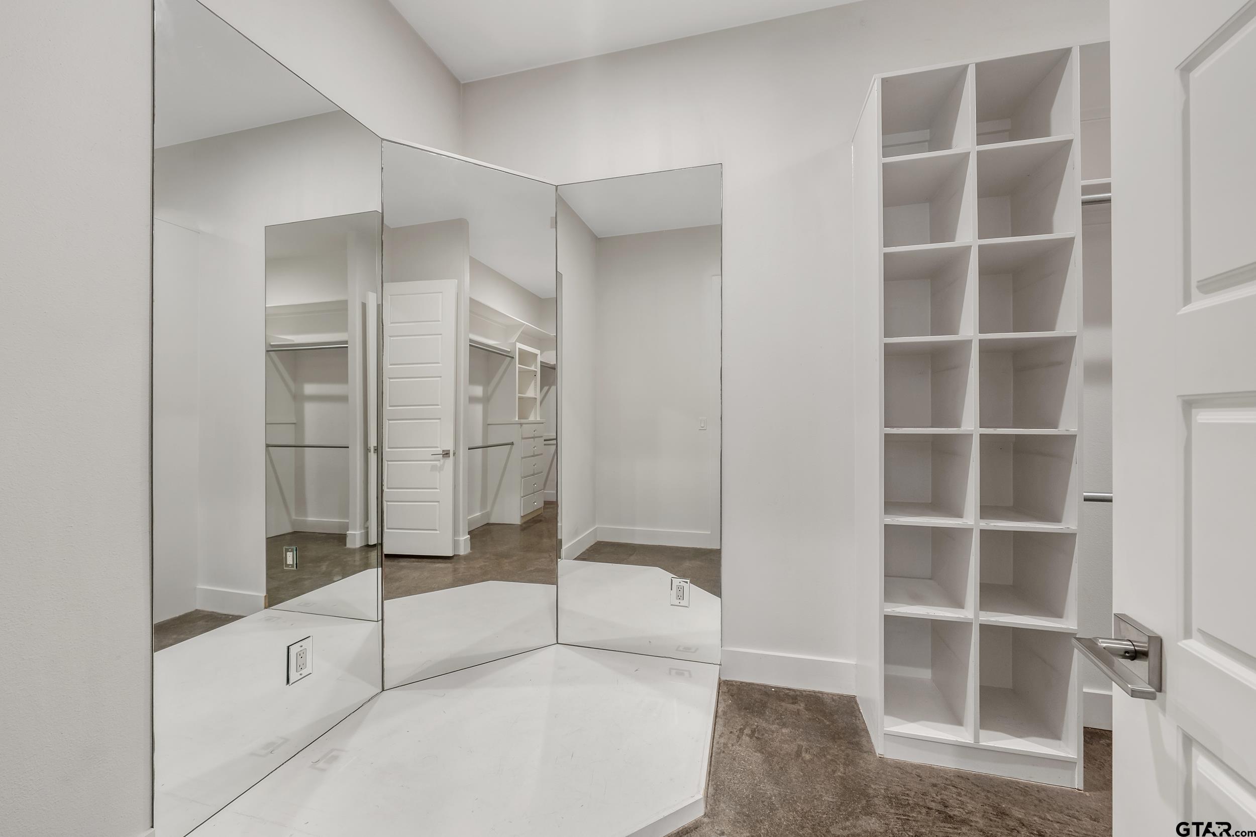 1569 Cooks Crossing Tyler, TX 75703 - Photo 20 of 39 a bathroom with a bathtub and a shower