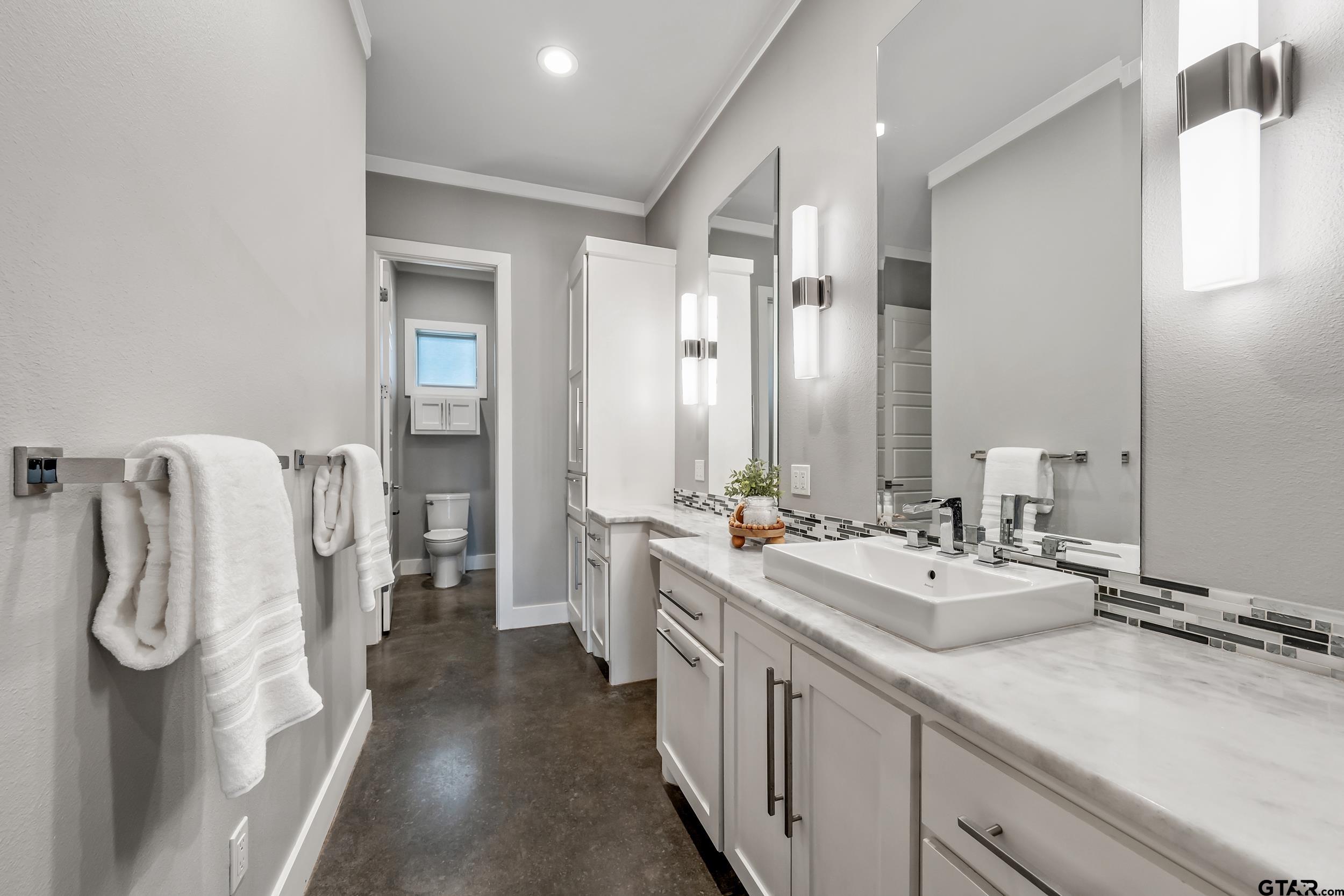 1569 Cooks Crossing Tyler, TX 75703 - Photo 28 of 39 a bathroom with a double vanity sink mirror and double