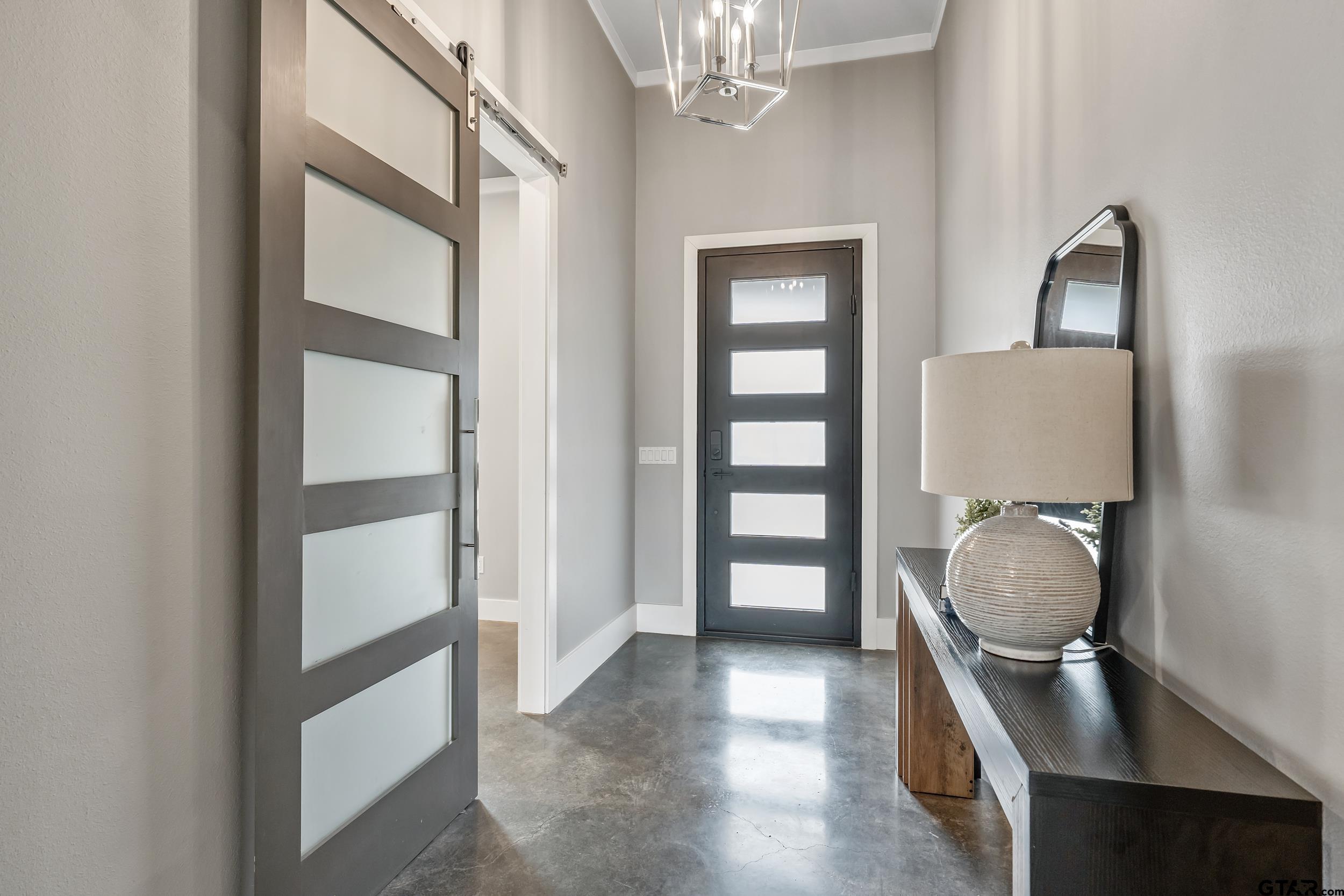 1569 Cooks Crossing Tyler, TX 75703 - Photo 5 of 39 a room with furniture and a window