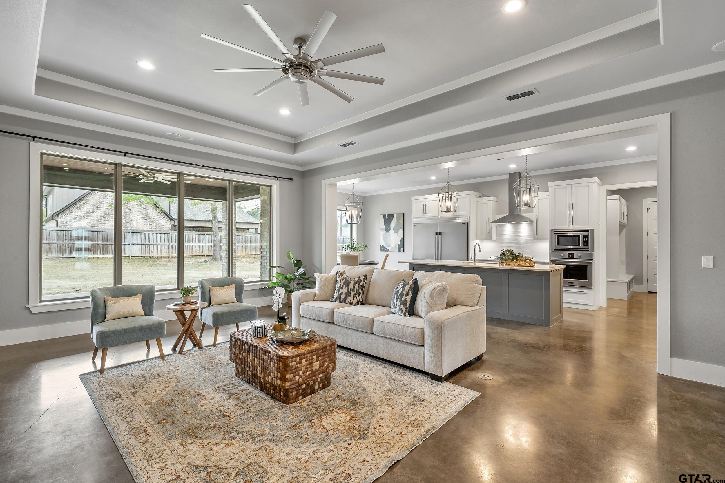 1569 Cooks Crossing Tyler, TX 75703 - Photo 6 of 39 a living room with furniture and a large window
