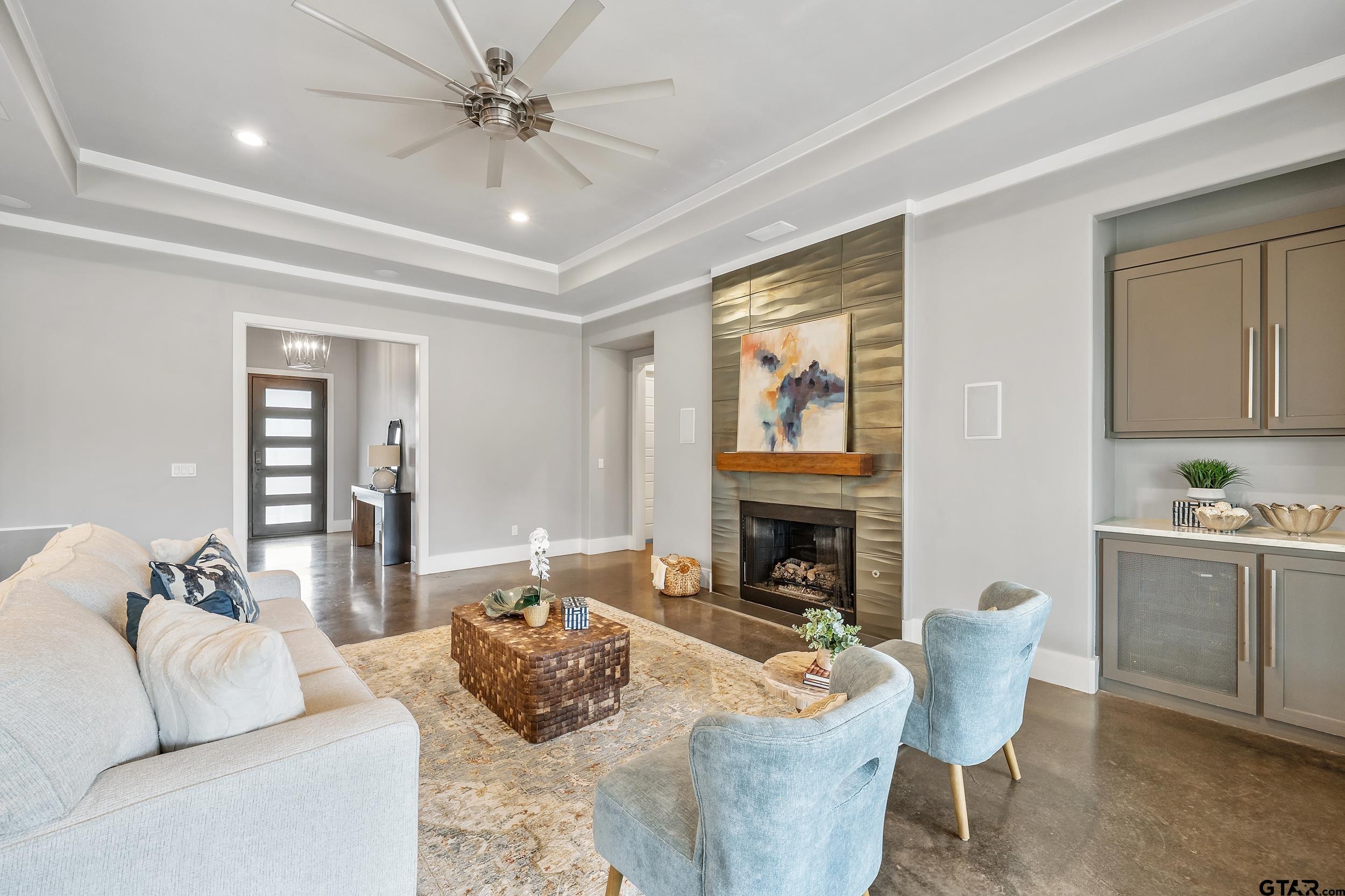 1569 Cooks Crossing Tyler, TX 75703 - Photo 7 of 39 a living room with furniture fireplace and a table