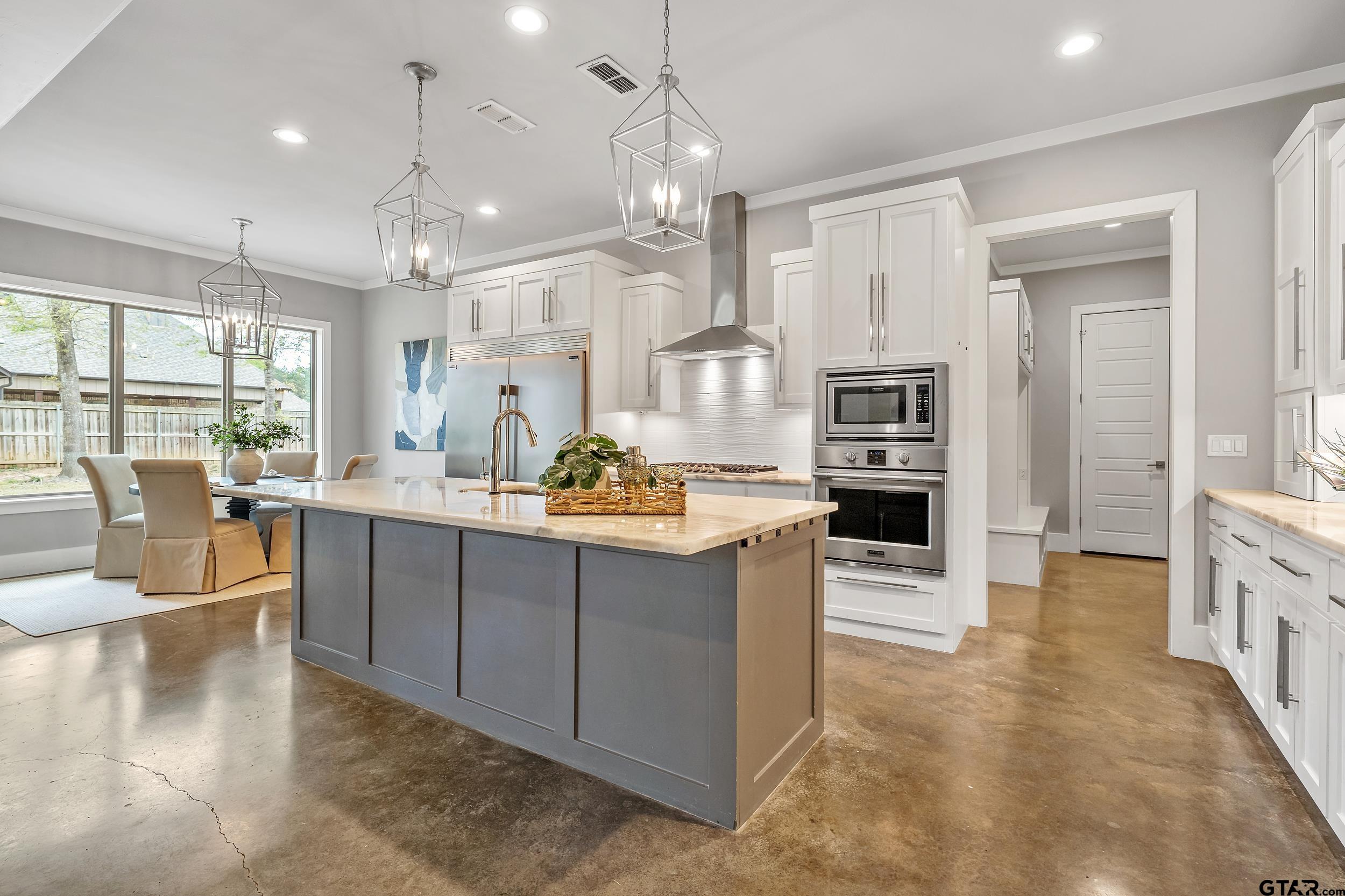 1569 Cooks Crossing Tyler, TX 75703 - Photo 10 of 39 a view of kitchen with sink and refrigerator