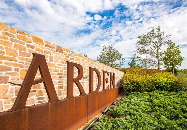 a view of a swimming pool with outdoor seating