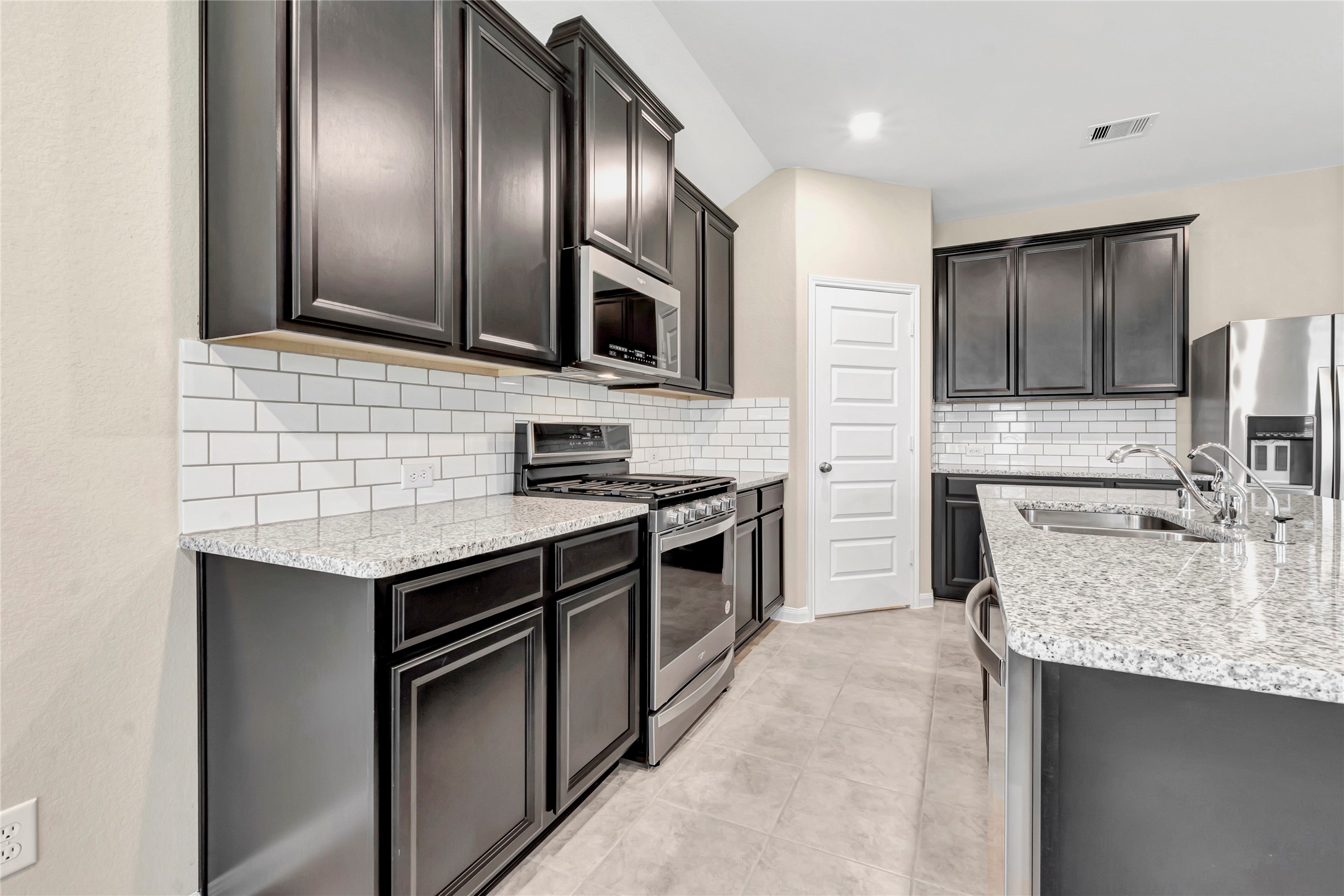 2702 Chancellor Rosenberg, TX 77471 - Photo 3 of 30 Photo is not of the actual home, but is an inspirational photo of builder’s model home and may depict options, furnishings, and/or decorator features that are not included