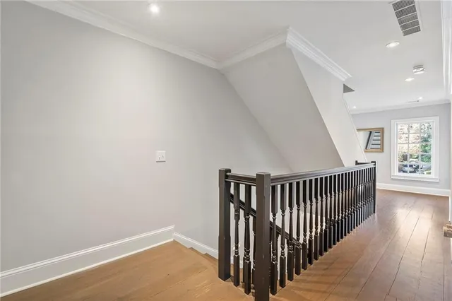 a bathroom with a sink mirror and vanity