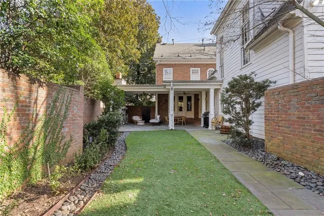 a view of entryway with flower plants