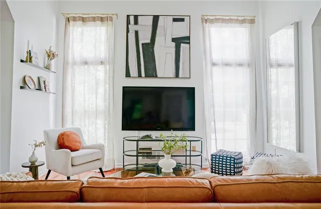 a view of livingroom with furniture and windows