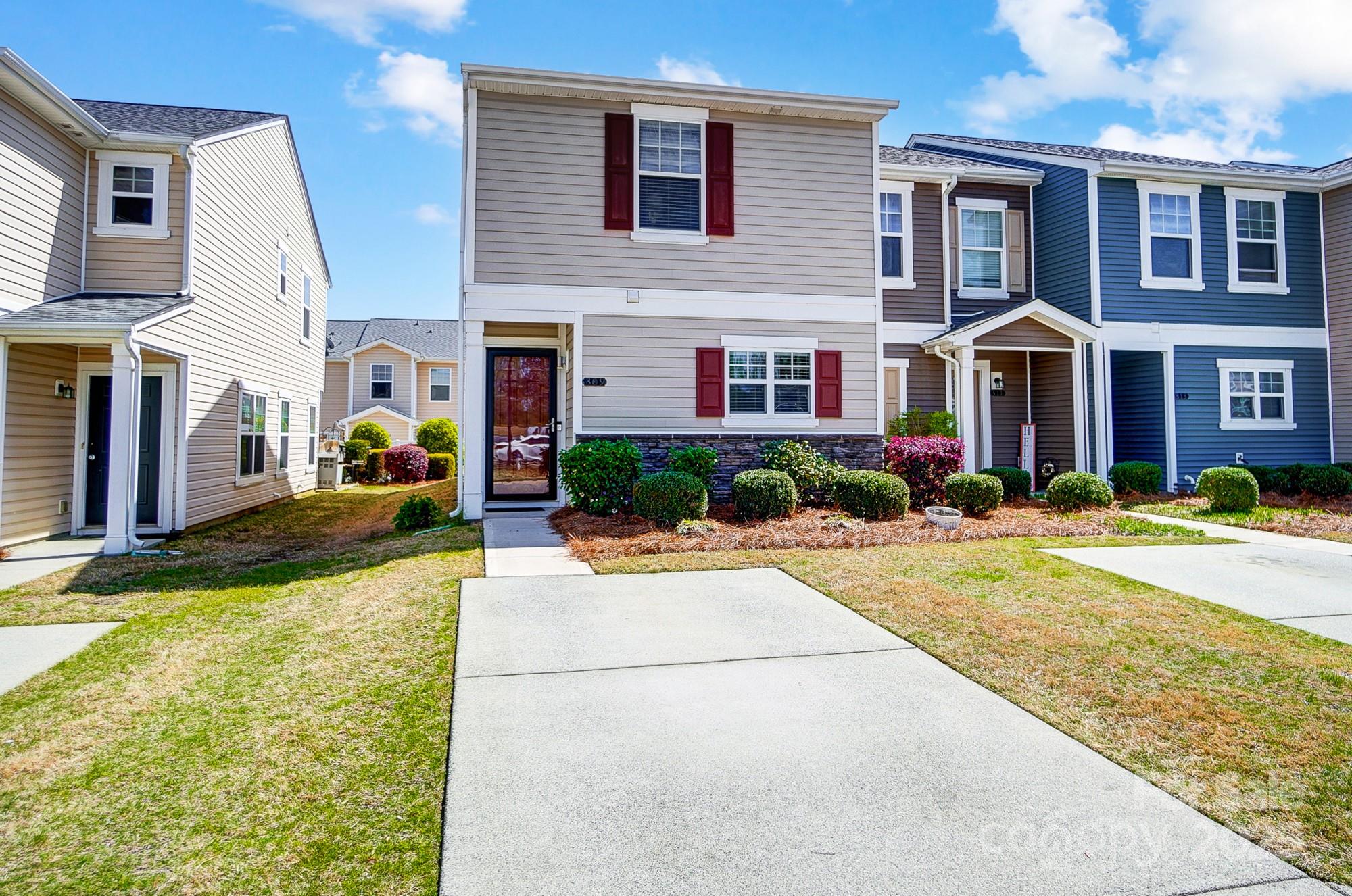 309 River Clay Road Fort Mill, SC 29708 - Photo 2 of 35 a front view of house with yard