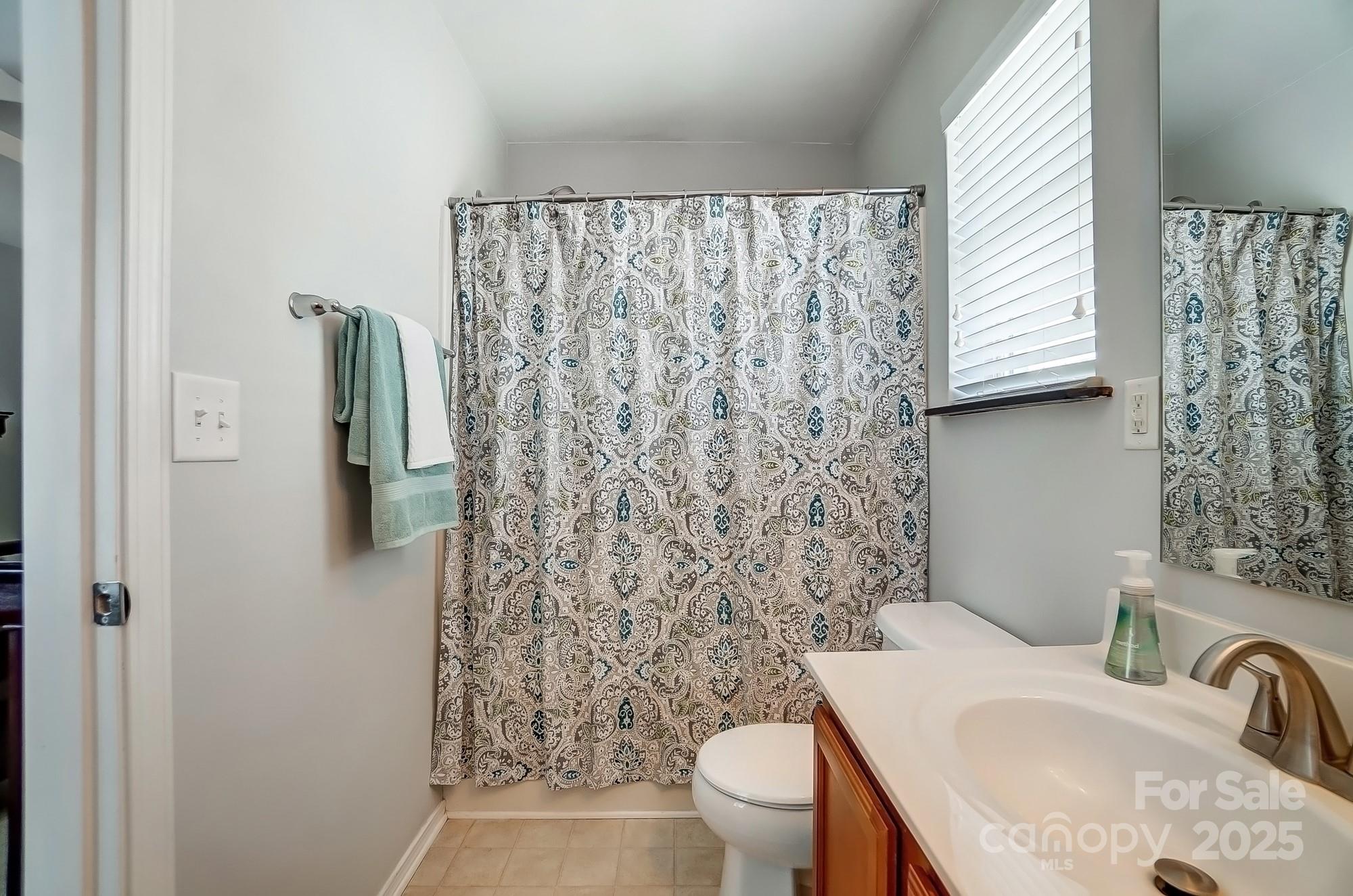 309 River Clay Road Fort Mill, SC 29708 - Photo 23 of 35 a bathroom with a sink toilet and shower
