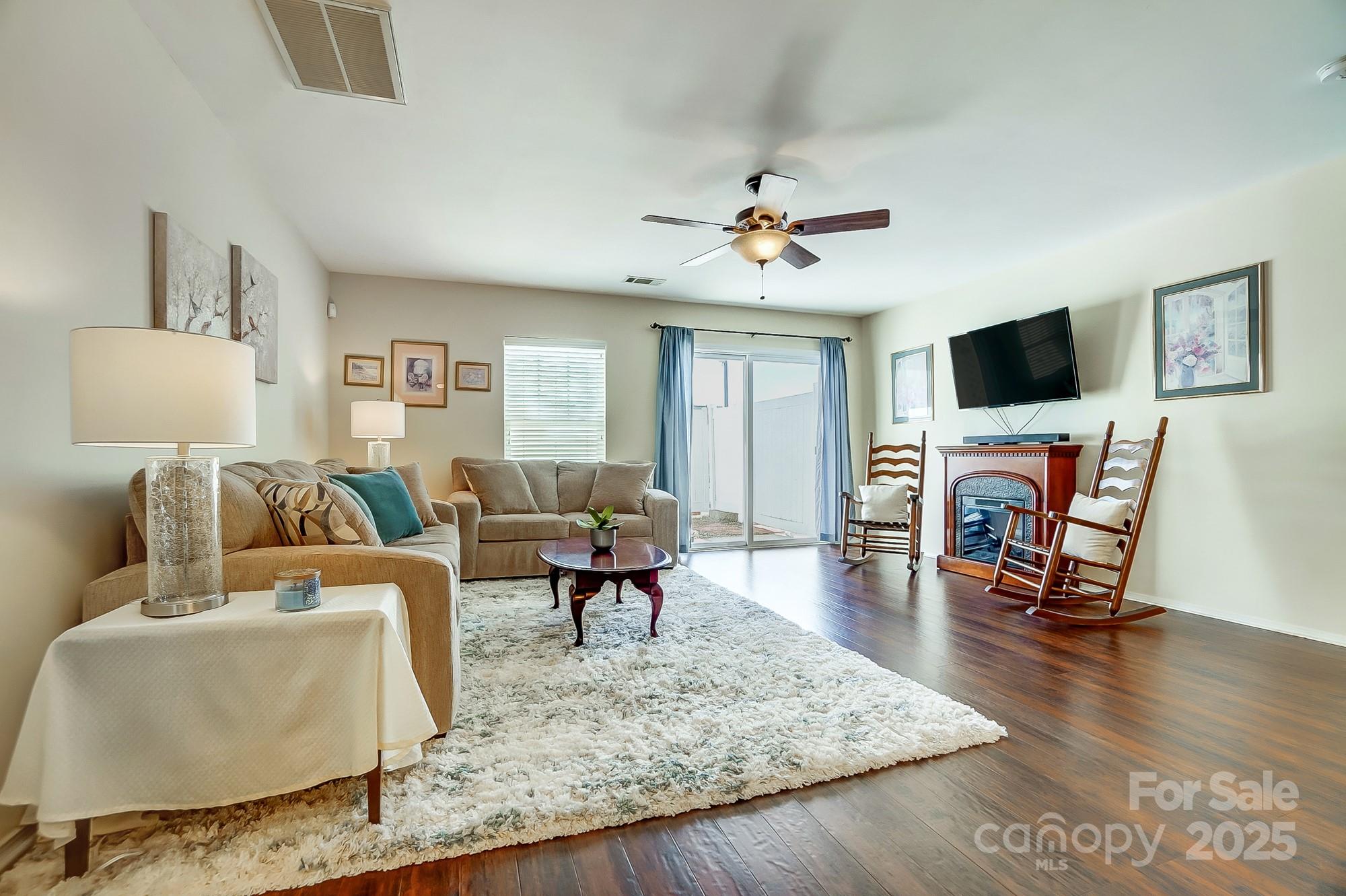 309 River Clay Road Fort Mill, SC 29708 - Photo 6 of 35 a living room with furniture and a flat screen tv
