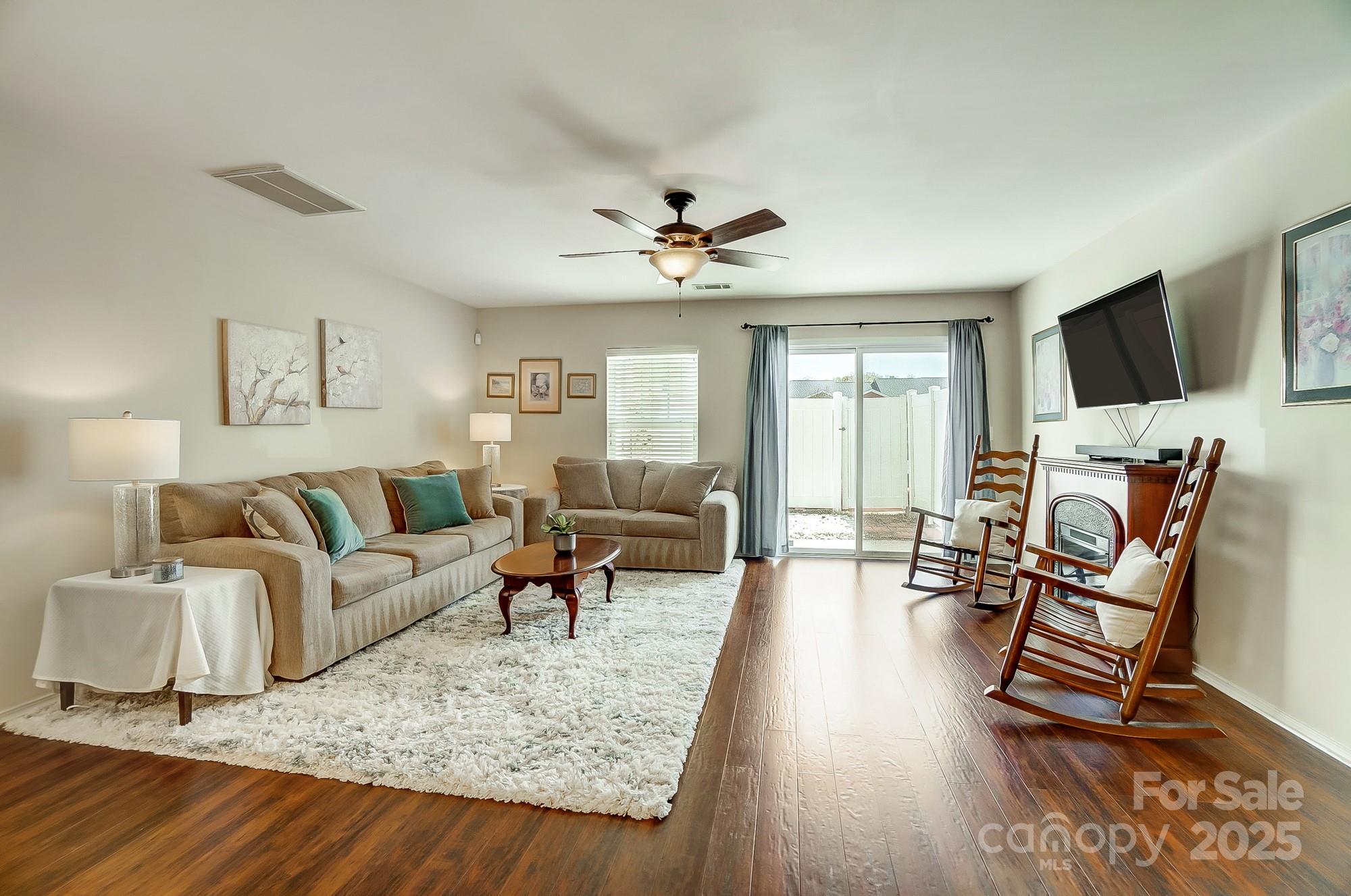 309 River Clay Road Fort Mill, SC 29708 - Photo 7 of 35 a living room with furniture and a flat screen tv