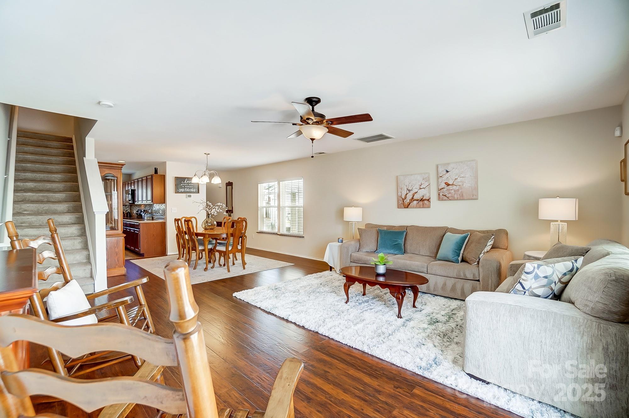 309 River Clay Road Fort Mill, SC 29708 - Photo 9 of 35 a living room with furniture and view of kitchen