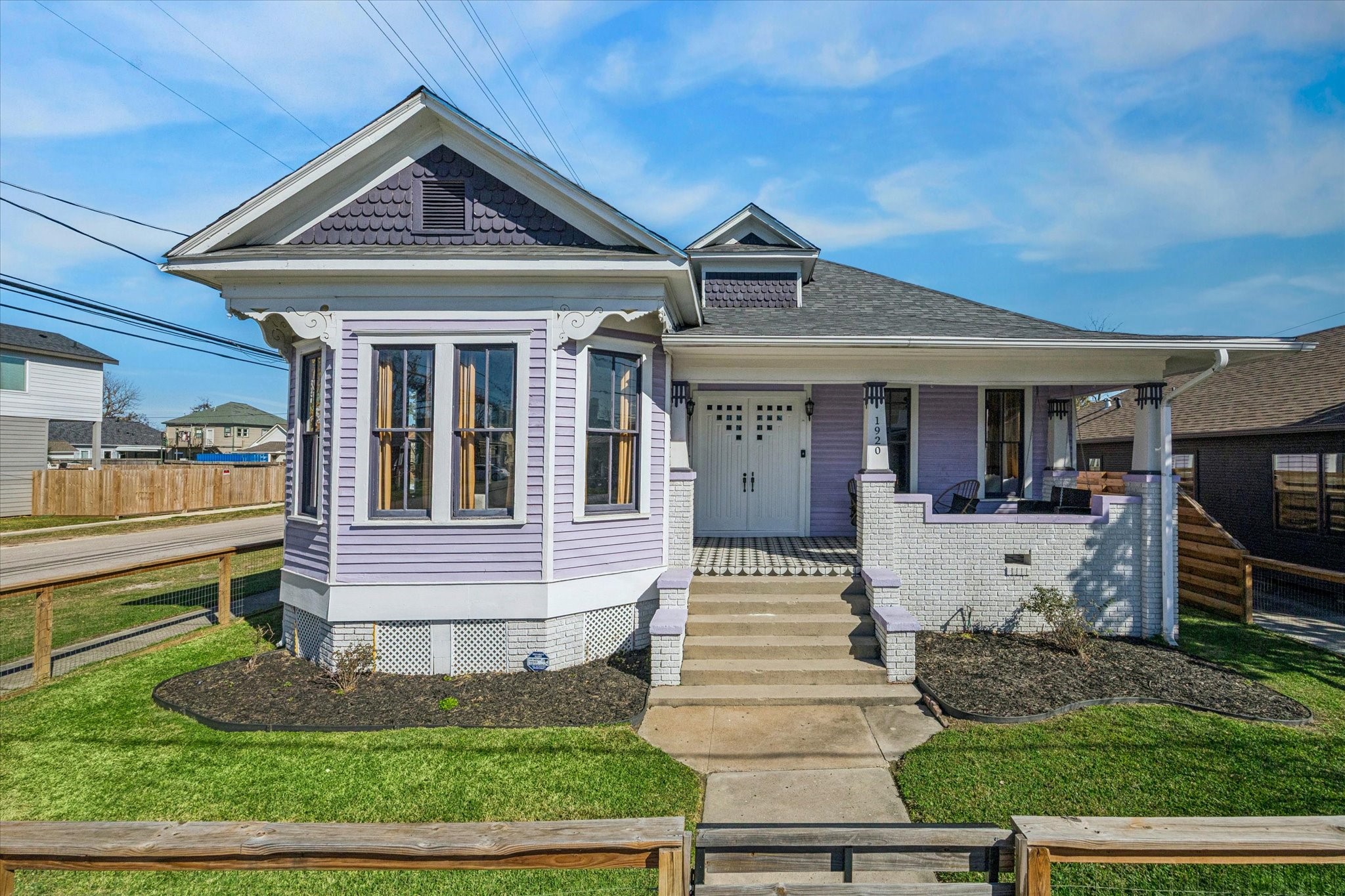 1920 Fulton Street Houston, TX 77009 - Photo 2 of 39 a front view of a house with garden
