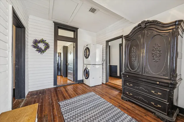 a bed room with a bed and a window