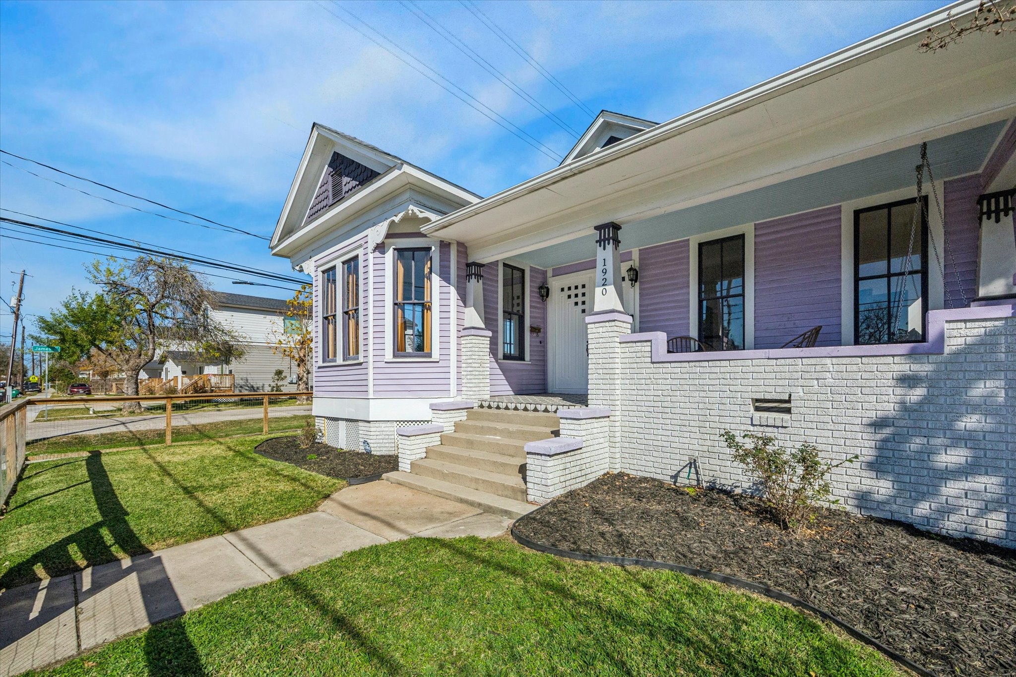 1920 Fulton Street Houston, TX 77009 - Photo 4 of 39 a front view of a house with a yard