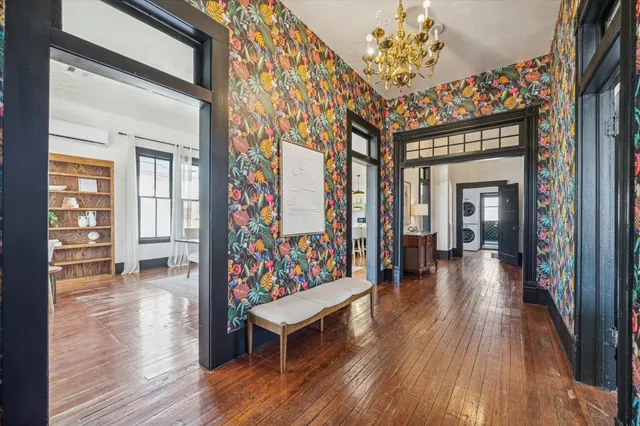 a bed room with a bed and a window