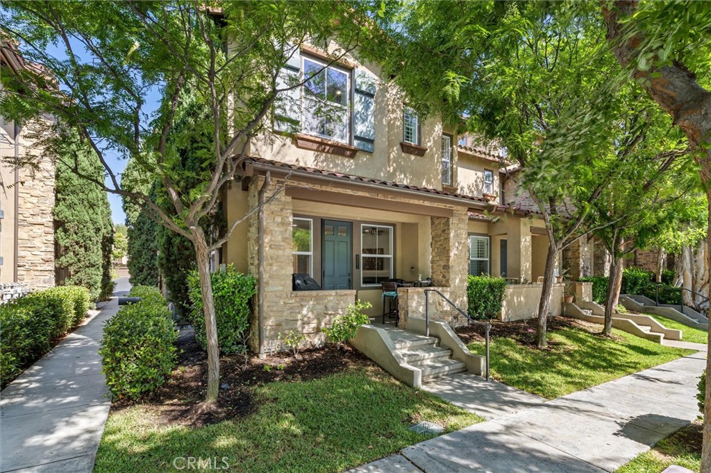 119 Jadestone Irvine, CA 92603 - Photo 1 of 27 front view of a house with a yard