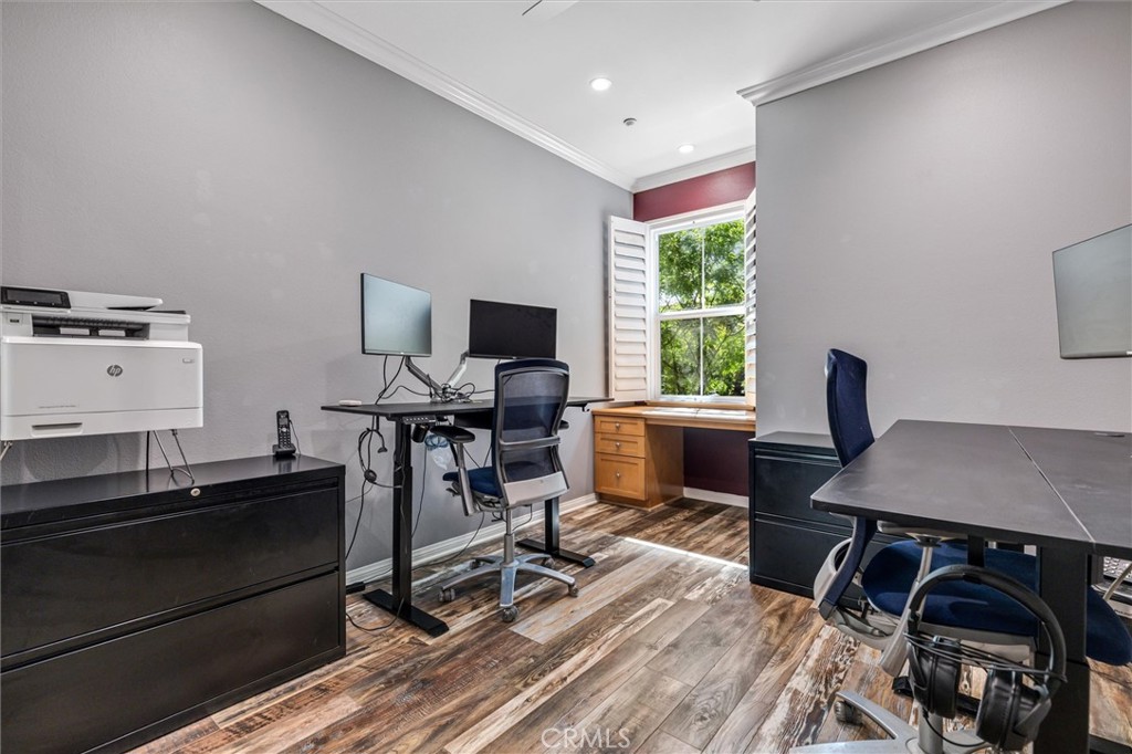 119 Jadestone Irvine, CA 92603 - Photo 16 of 27 a view of a workspace with furniture and a window