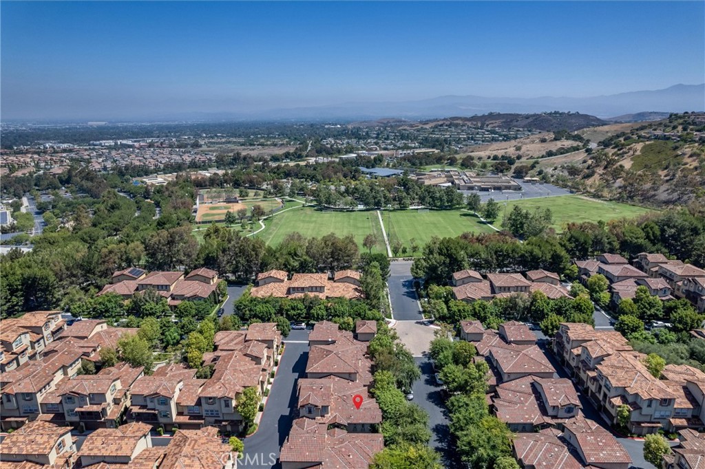 119 Jadestone Irvine, CA 92603 - Photo 22 of 27 an aerial view of a city with lots of residential buildings
