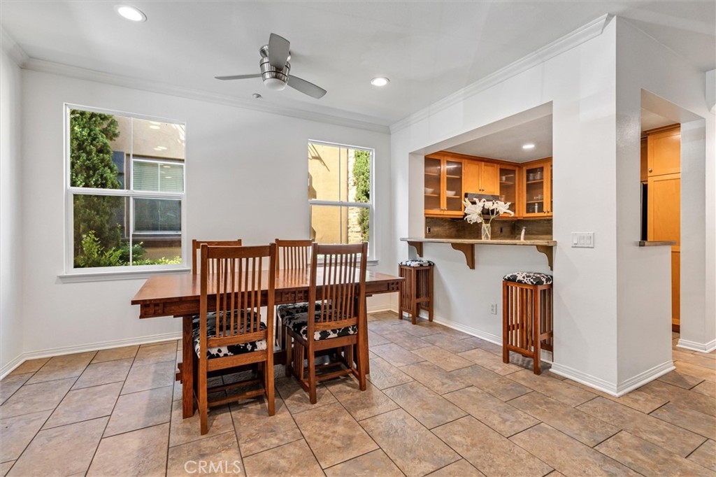 119 Jadestone Irvine, CA 92603 - Photo 5 of 27 a view of a dining room with furniture window and outside view