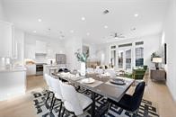 4619 Maxie Street Houston, TX 77007 - Photo 20 of 45 a view of a dining room with furniture wooden floor and a chandelier
