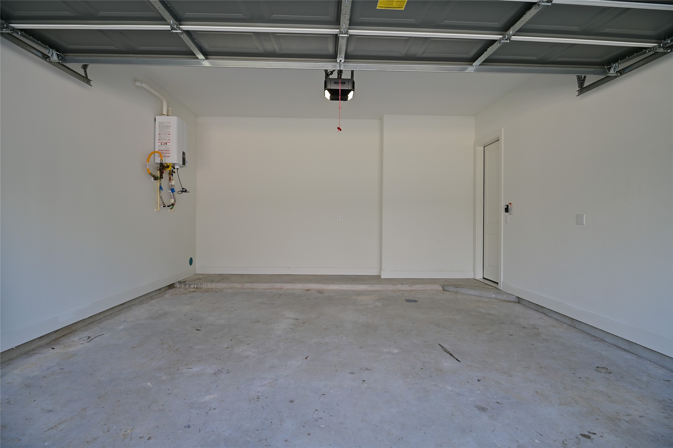 4619 Maxie Street Houston, TX 77007 - Photo 41 of 45 a view of a room with racks on the wall