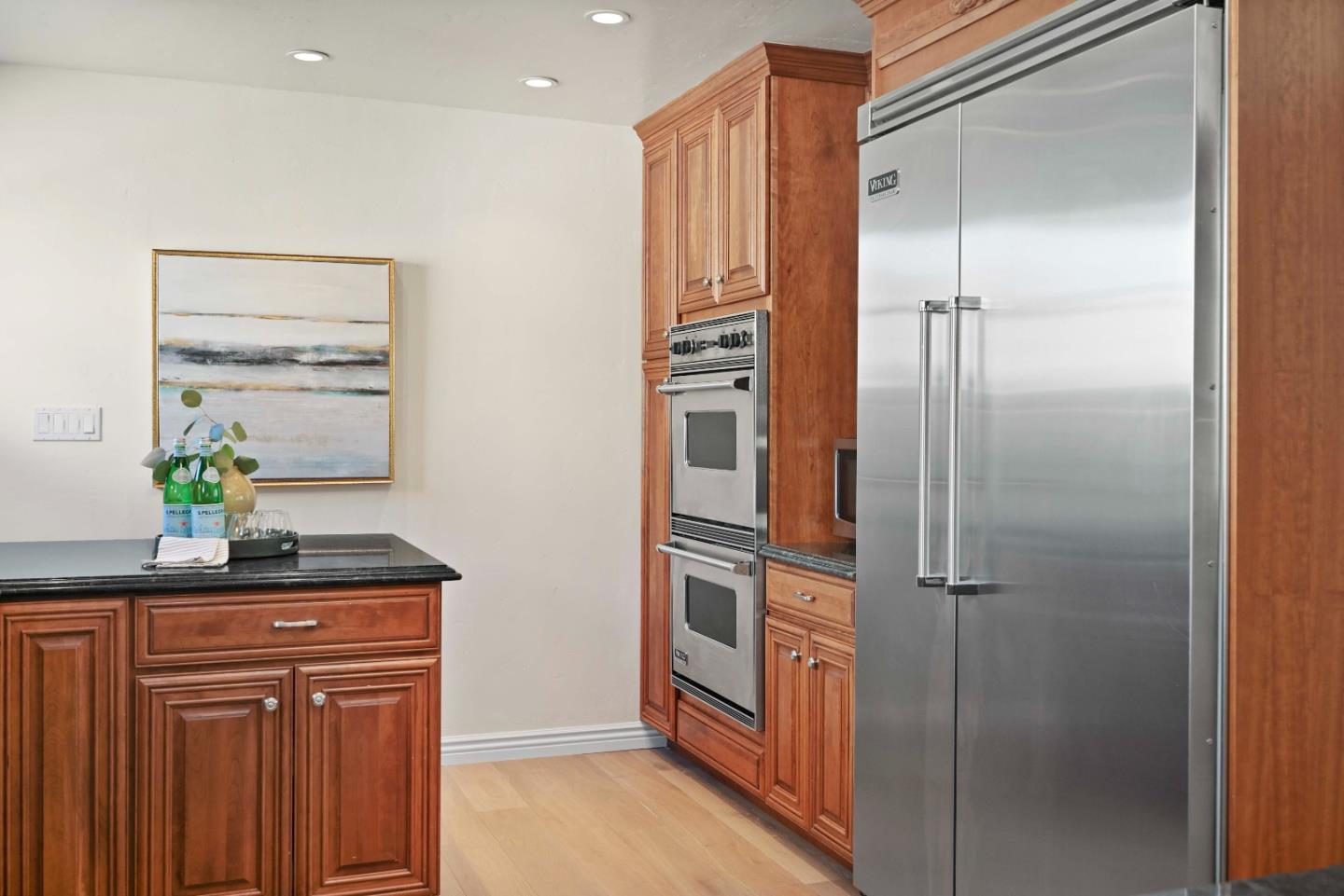 754 26th Avenue San Mateo, CA 94403 - Photo 21 of 57 a kitchen with stainless steel appliances a refrigerator and a sink