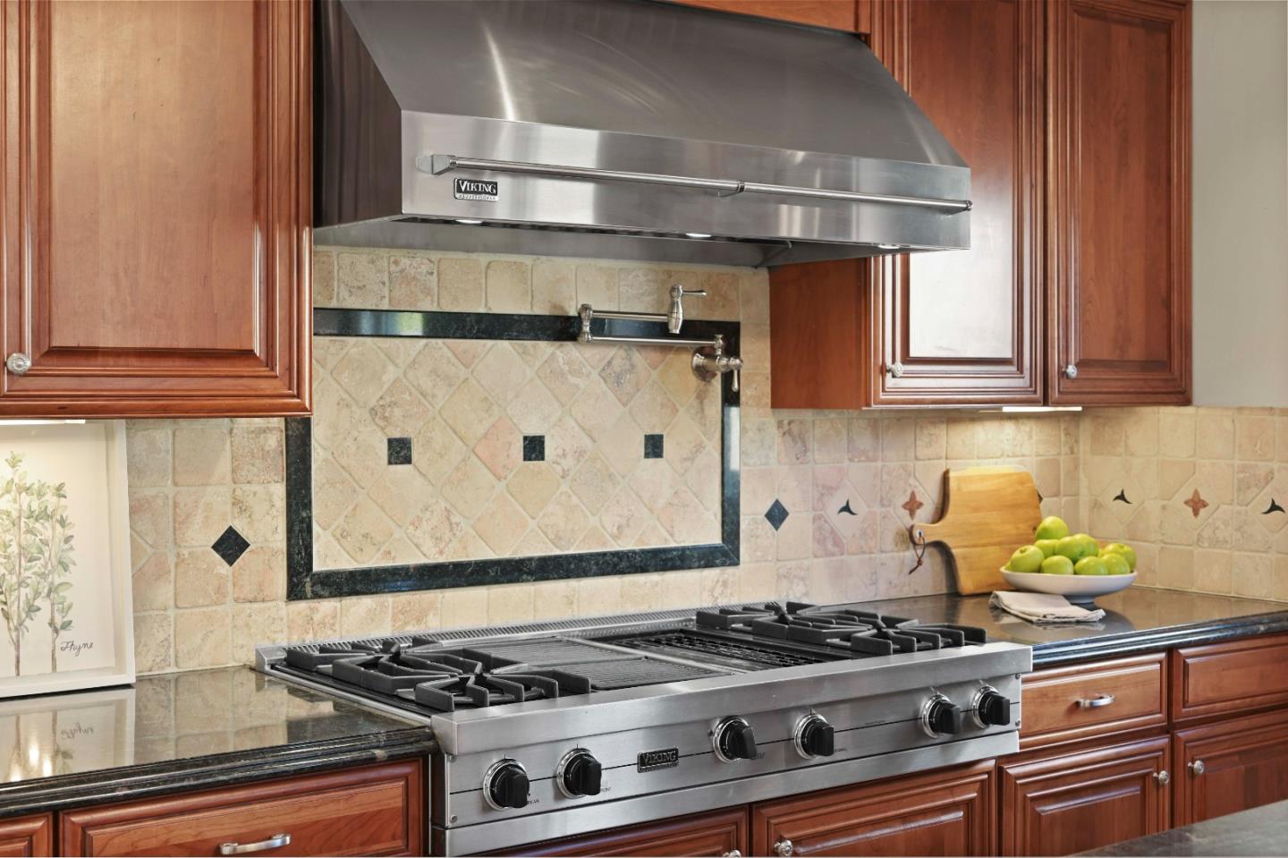 754 26th Avenue San Mateo, CA 94403 - Photo 22 of 57 a stove top oven sitting inside of a kitchen