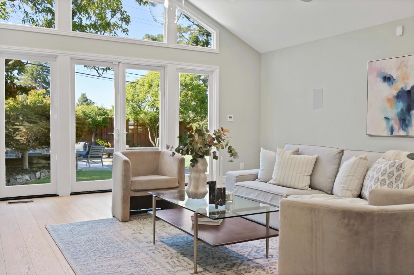 754 26th Avenue San Mateo, CA 94403 - Photo 24 of 57 a living room with furniture and a potted plant