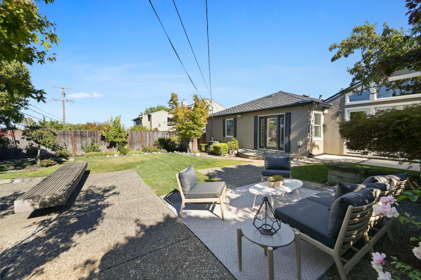 754 26th Avenue San Mateo, CA 94403 - Photo 30 of 57 a view of a patio with couches table and chairs and potted plants