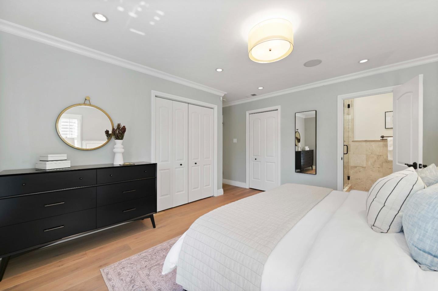 754 26th Avenue San Mateo, CA 94403 - Photo 34 of 57 a bedroom with a bed and a mirror