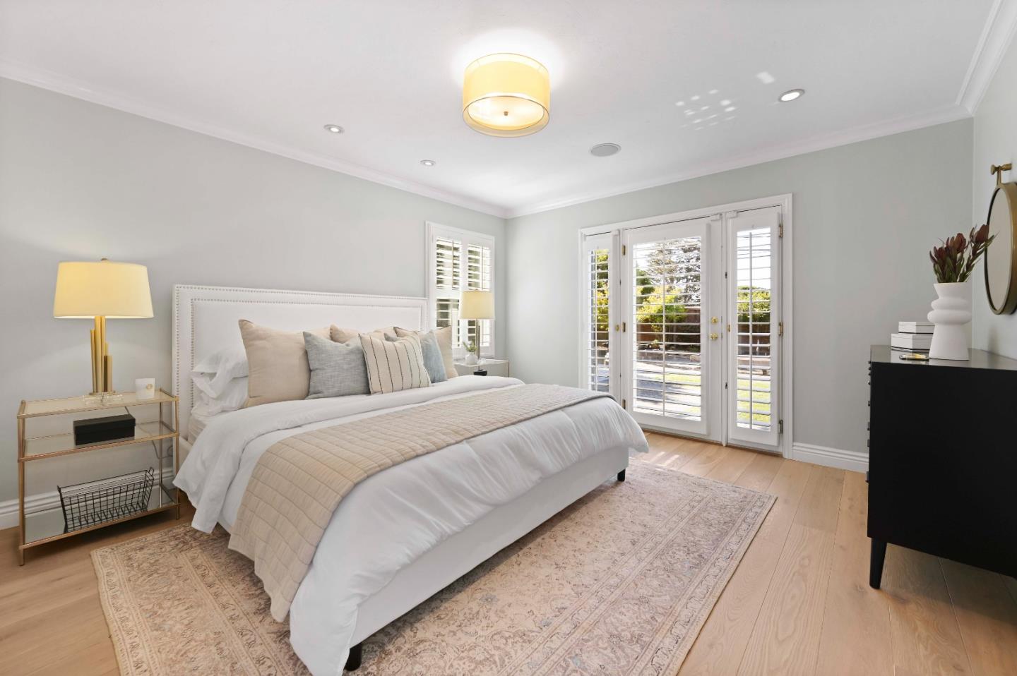 754 26th Avenue San Mateo, CA 94403 - Photo 37 of 57 a spacious bedroom with a bed and a lamp